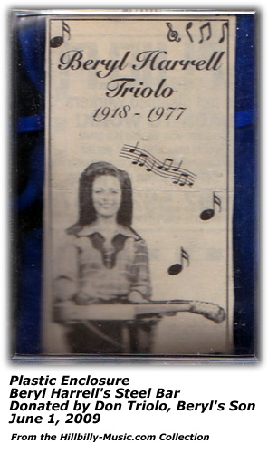 Beryl Harrell's Steel Bar (Plastic case - note) donated by her son, Don Triolo