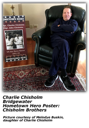 Charlie Chisholm with Hometown Hero Flag